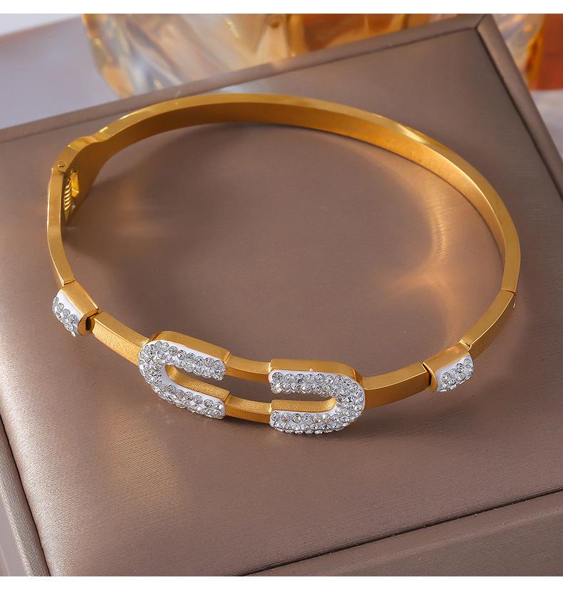 Minimalist European-American Gold-Plated Titanium Steel Bangle with Geometric Design and Diamond Detailing