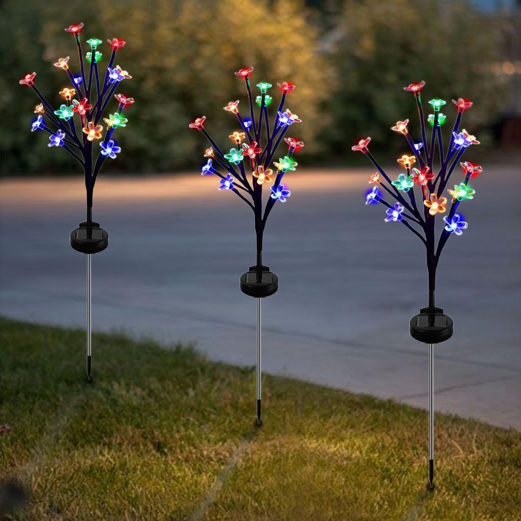 Colorful/warm light solar-powered cherry blossom branch ground light, suitable for outdoor gardens, patios, lawns, and walkways.