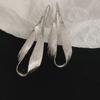 "Exquisite Metallic Leaf Drop Earrings: European & American Style, Trendy and Unique Design for Women."