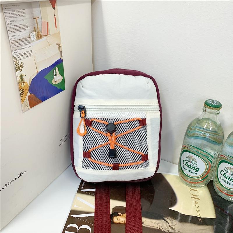 Small square bag new men's and women's street drawstrings out of the street contrasting colors fashionable small backpack