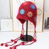 Handmade crocheted ear protection hat women's autumn and winter ethnic style colored flower knitted hat fringed strap ball bag head wool hat