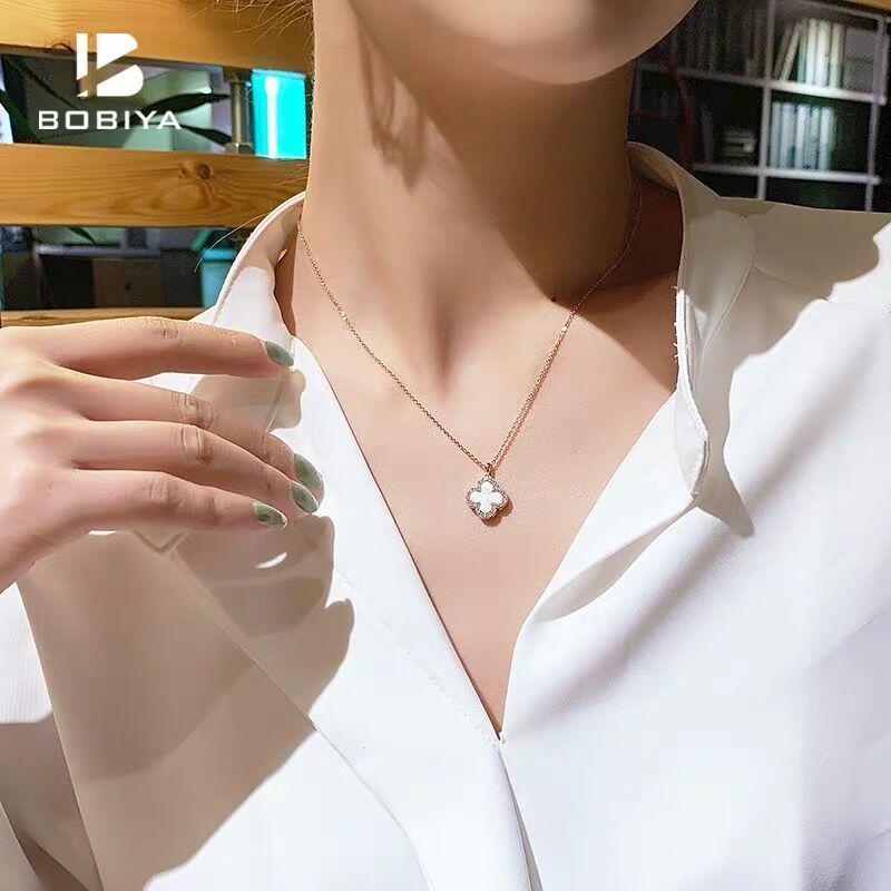 Elegant Double-Sided Four-Leaf Clover Necklace - Rose Gold Plated with Black & White Enamel, Micro-Inlaid Zirconia for Women