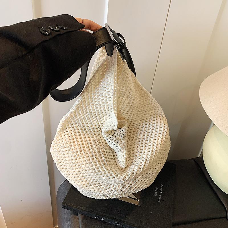 Summer niche fashion versatile woven rope hollow tote design mesh pocket portable child and mother bag shoulder bag