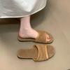 New casual versatile flat-bottomed cool slippers, wearing beach wind hollow-woven niche slippers