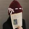 Bonnet en laine Golji bicolore rose à revers pour femme