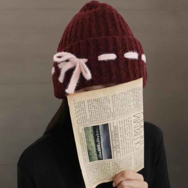 Bonnet en laine Golji bicolore rose à revers pour femme