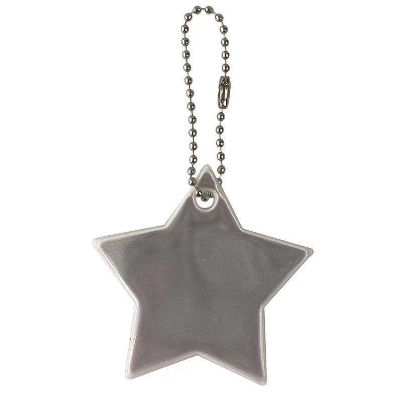 Reflective Star Pendant Keychain for Night Riding: Safety Accessory for Backpack or Luggage.