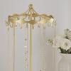 Iron Jewelry Display Stand with a Rotatable Upper Frame, Multiple Hanging Positions, and a Round Tray for Dresser Storage and Presentation