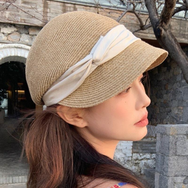 Spring and summer new French straw large brim sunscreen hat women's small face travel vacation visor