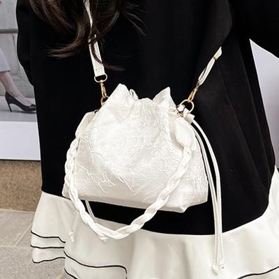 Nieuwe Chinese tas dames parel handtas 2025 zomer nieuwe vlinder jacquard emmer tas premium schoudertas