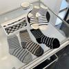 Women's mid-calf socks for autumn and winter, black and white thickened warm striped socks, color-blocked women's soft and glutinous socks for women