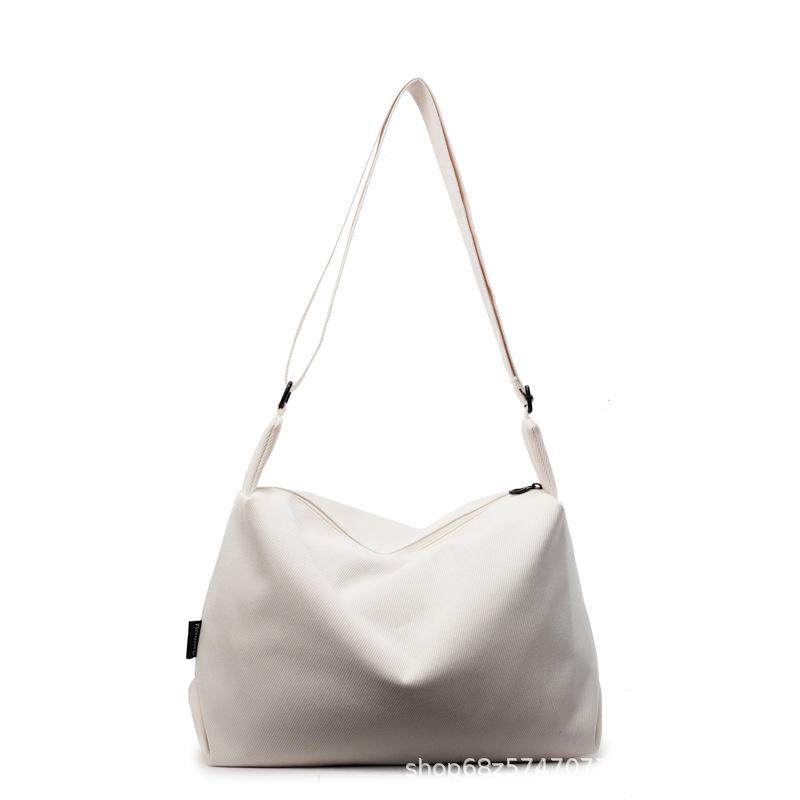 2025 New Canvas Casual Large Capacity Commuter Bag Women's One Shoulder Crossbody Bag Women's Bag Fashionable Versatile Tote Bag