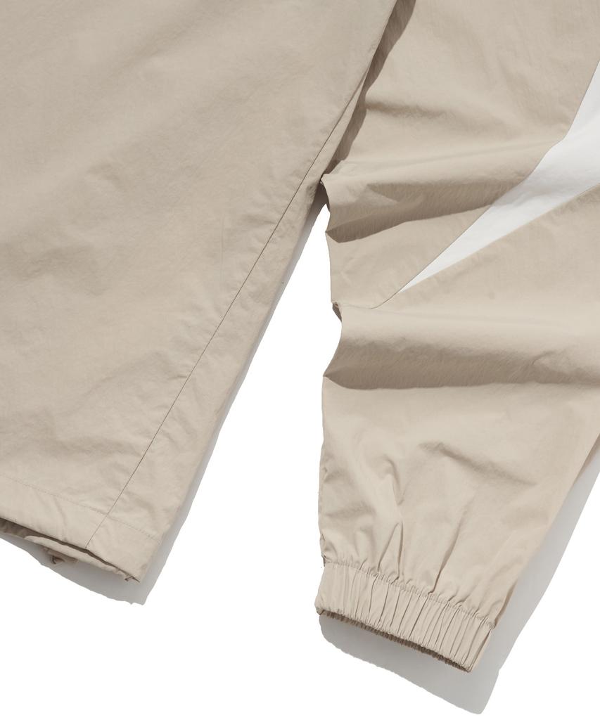 REEBOK Ellipse Woven Piste - Beige