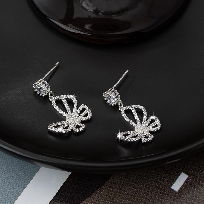 Pearl butterfly earrings women's zircon hollow high-end light luxury earrings exquisite and sweet personality fashion temperament earrings
