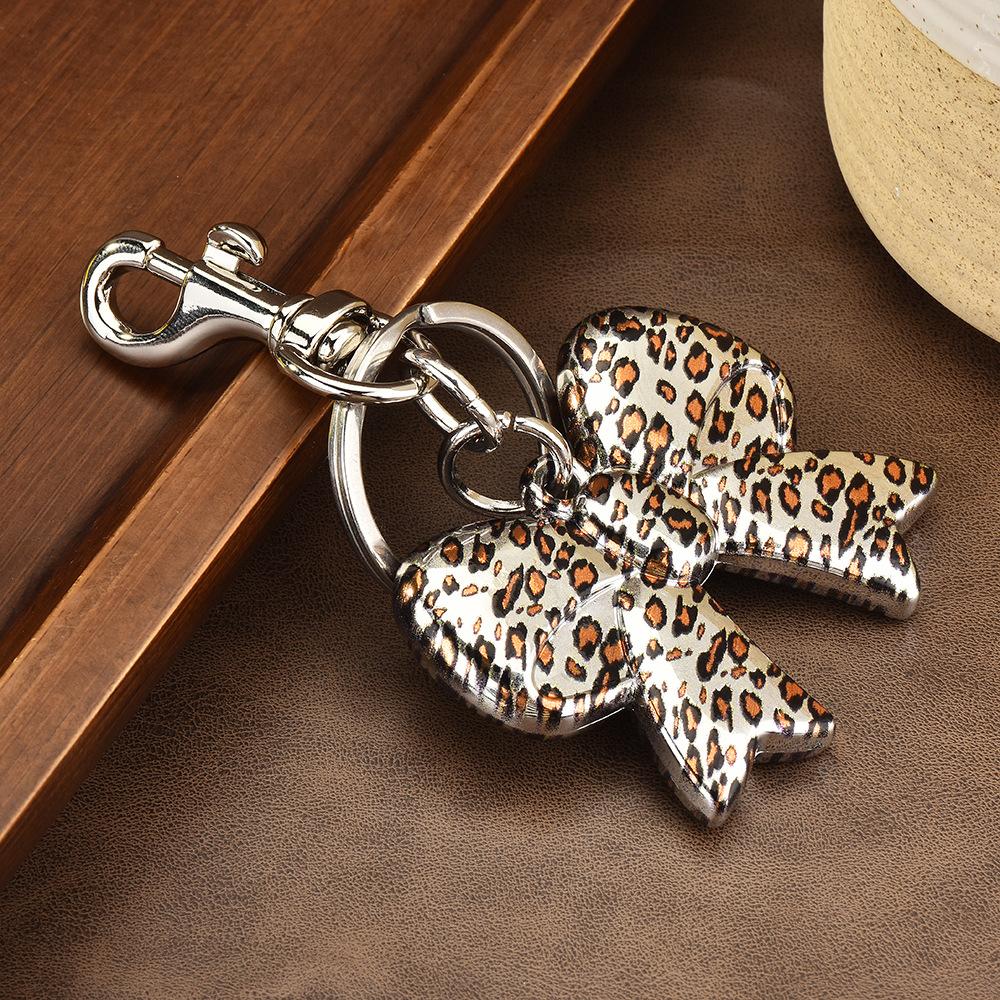 Autumn and Winter Leopard Hole Bow Love Pendant Acrylic Diy Jewelry Bag Accessories Pendant Necklace