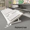 Keyboard Riser Stand: Elevate and angle your keyboard for more comfortable typing, featuring a non-slip design.
