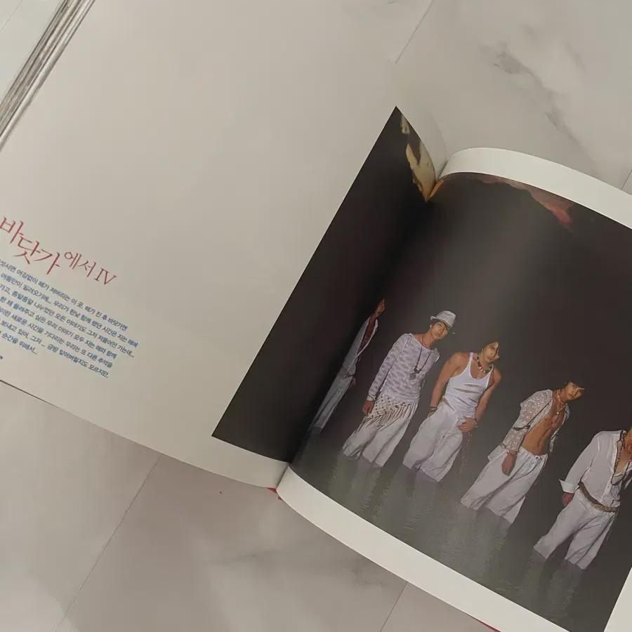 

Tvxq Rising Sun Переиздание Книга-история 4