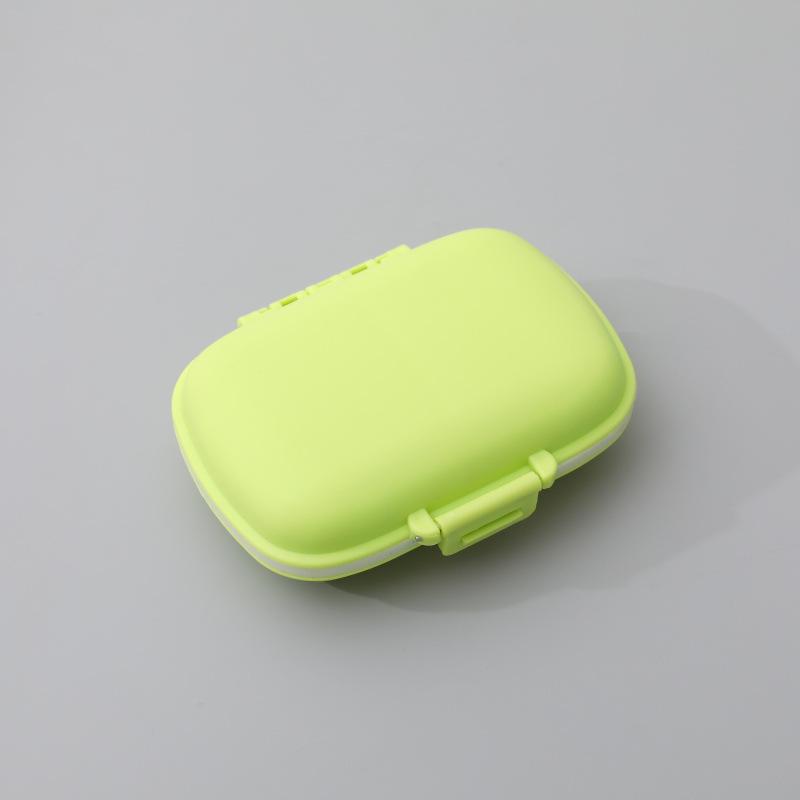 Moisture-proof 8-Compartment Pill Box: Portable Weekly Medicine Organizer.