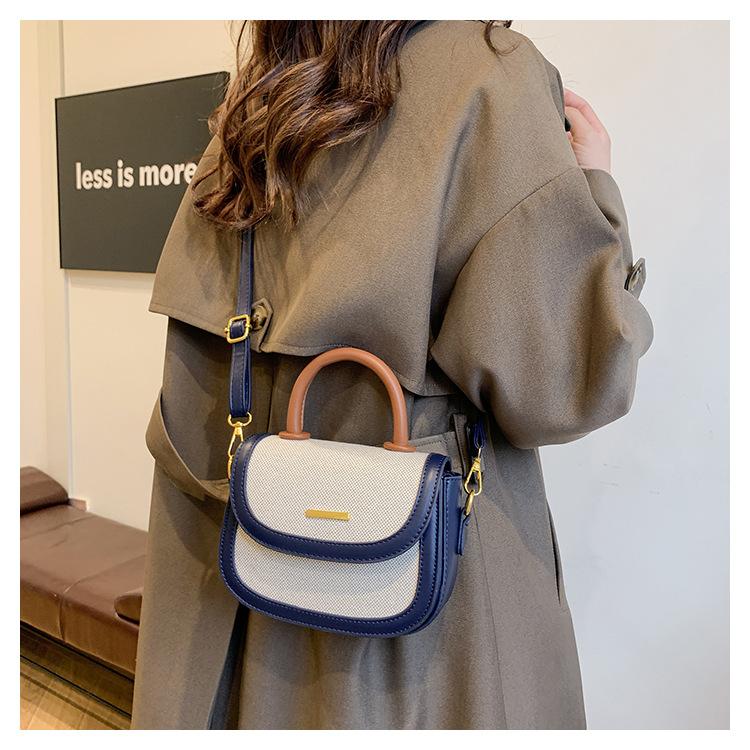 Borsa a sella portatile con texture premium da donna, nuova borsa a tracolla messenger retrò alla moda con inserti a contrasto di colore