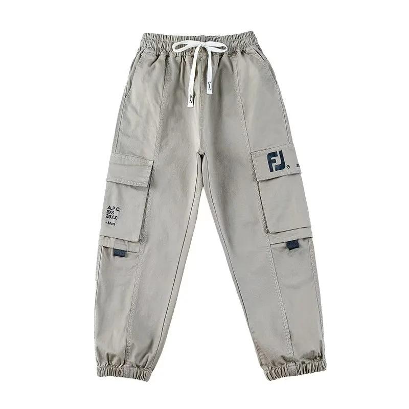 Klučičí trendy volné jarní/podzimní kombinézy s velkými kapsami a manžetami u kotníků - ležérní dětské módní sportovní kalhoty