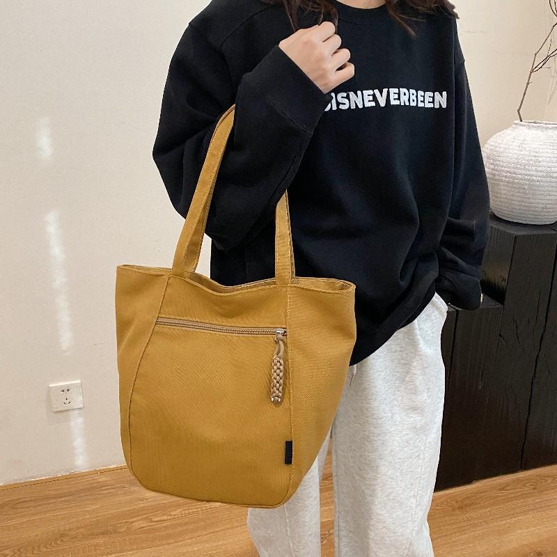 Customized bags for women 2025 new large-capacity tote bags, commuter tote bags, student women's shoulder bags.