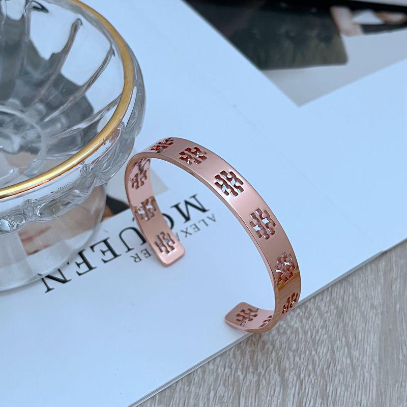 

Европейская и американская мода Открытый металлический браслет с полым дизайном английских букв розового золота
