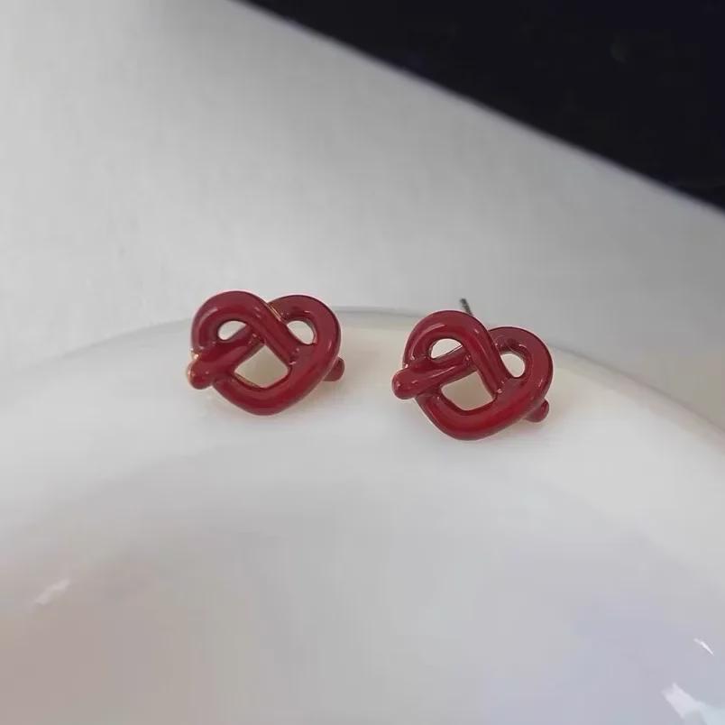 Brytyjskie Kolczyki Mini Węzełki w Kształcie Serca