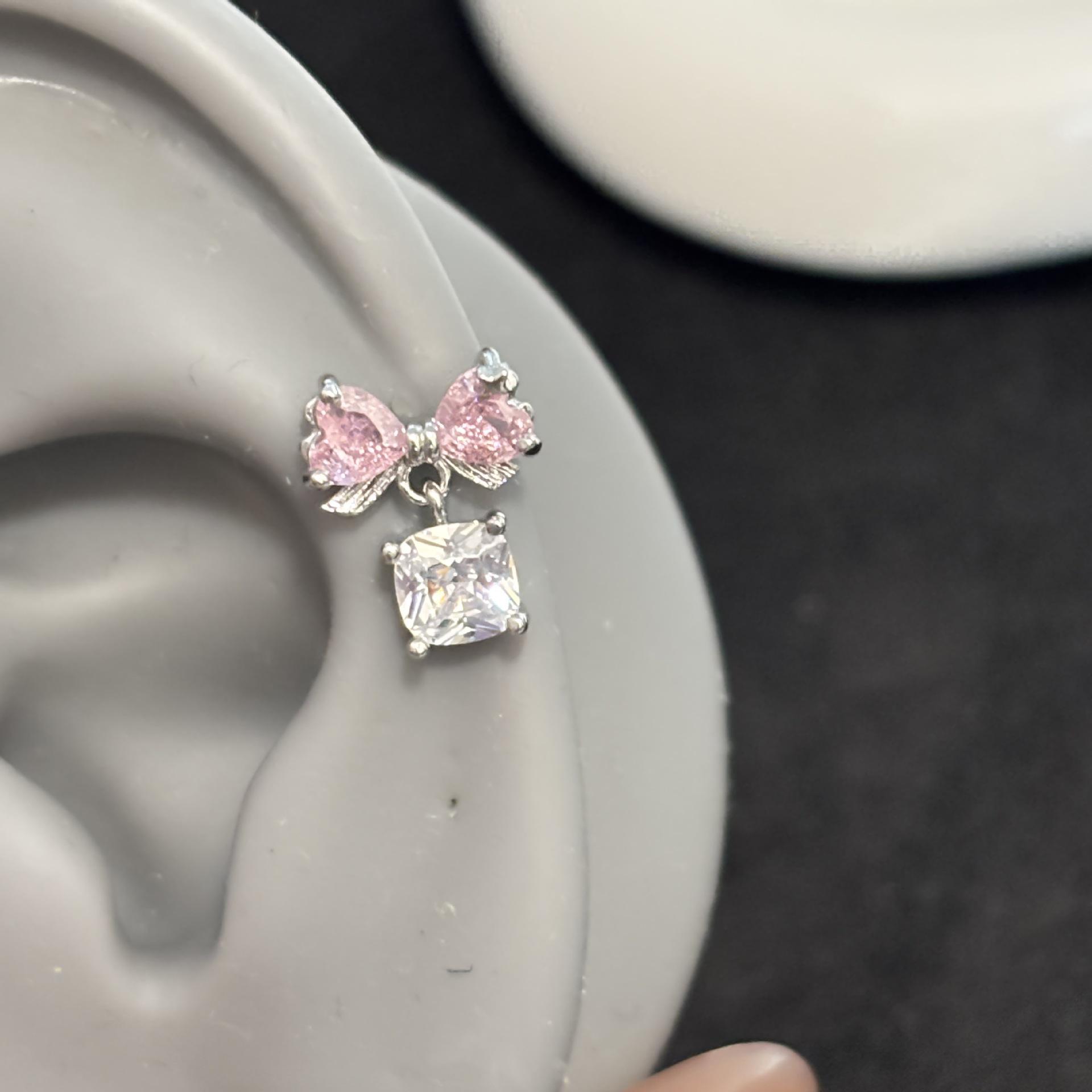 Exquisite Blue Zircon Bow Titanium Steel Earrings: Shiny, Niche Design for Women’s Ear Cartilage