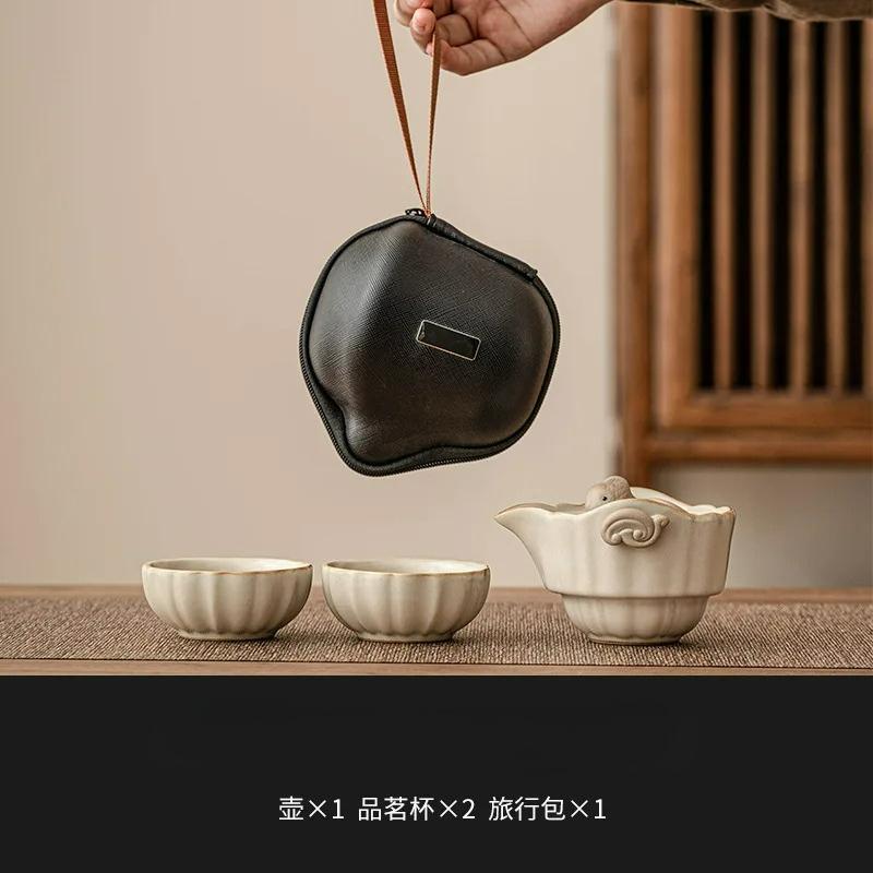 

One pot and two cups of beige ceramic Ru kiln travel tea set portable outdoor brewing equipment set