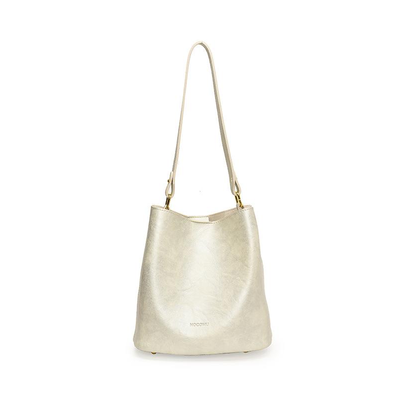 Retro hand bucket bag women's 2025 new fashion one shoulder mother and child bag simple casual niche messenger bag