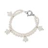 Reve silverfärgat pärlarmband med klockblomma
