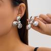 Elegant Textured Metal Flower and Wing Stud Earrings – European & American Style