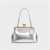 Hot sale European beautiful women bag light luxury retro fashion clip bag versatile shoulder bag metal frame handbag women