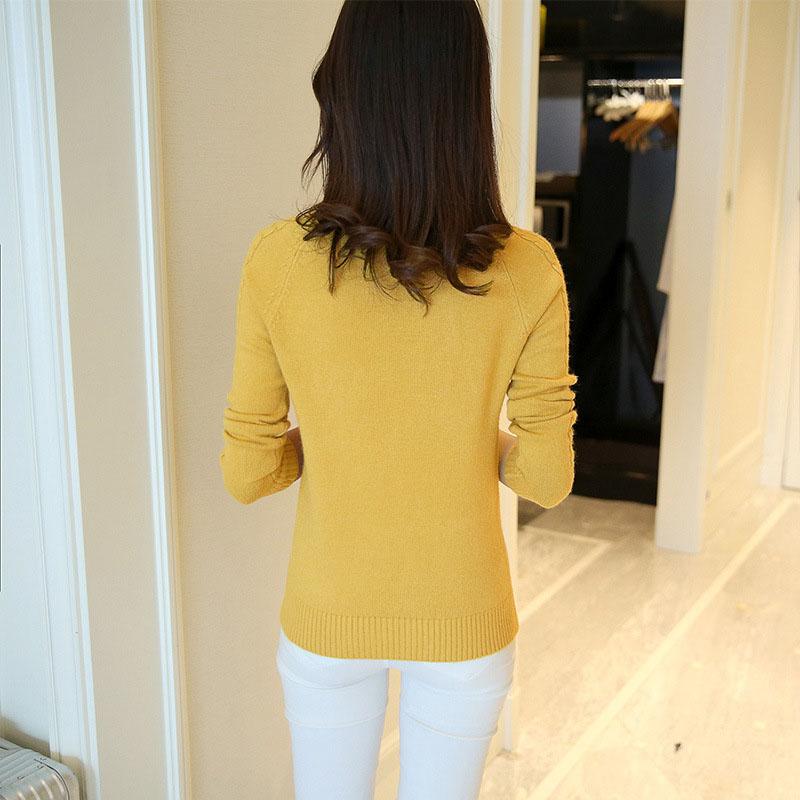 yellow pullover sweater