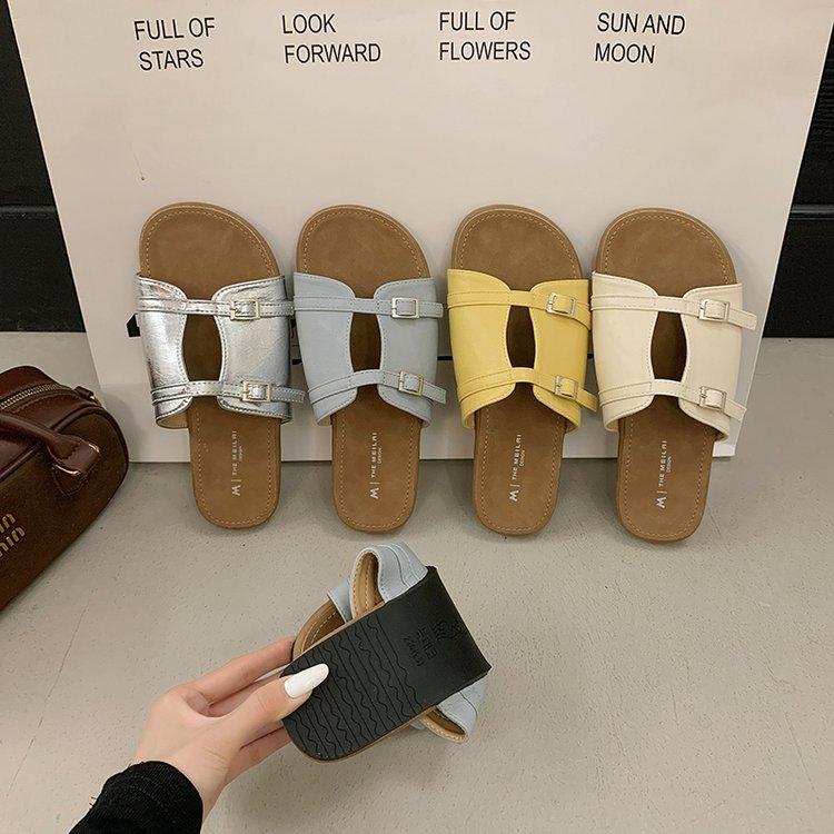 Pantoufles françaises à une pédale pour femmes 2025 nouvel été extérieur à semelle plate pantoufles à un mot double boucle plage cool pantoufles femmes