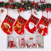 Decorative Red Christmas Stockings With Fun Cartoon Designs Of Santa Snowman Reindeer Bear For Vibrant Celebrations Festive