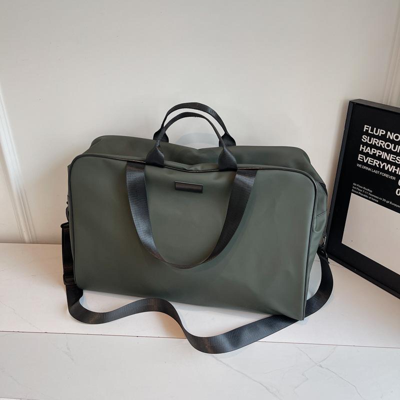 

Tooling wind large-capacity travel bag new fashion portable messenger bag simple and light short-distance luggage bag зелёный