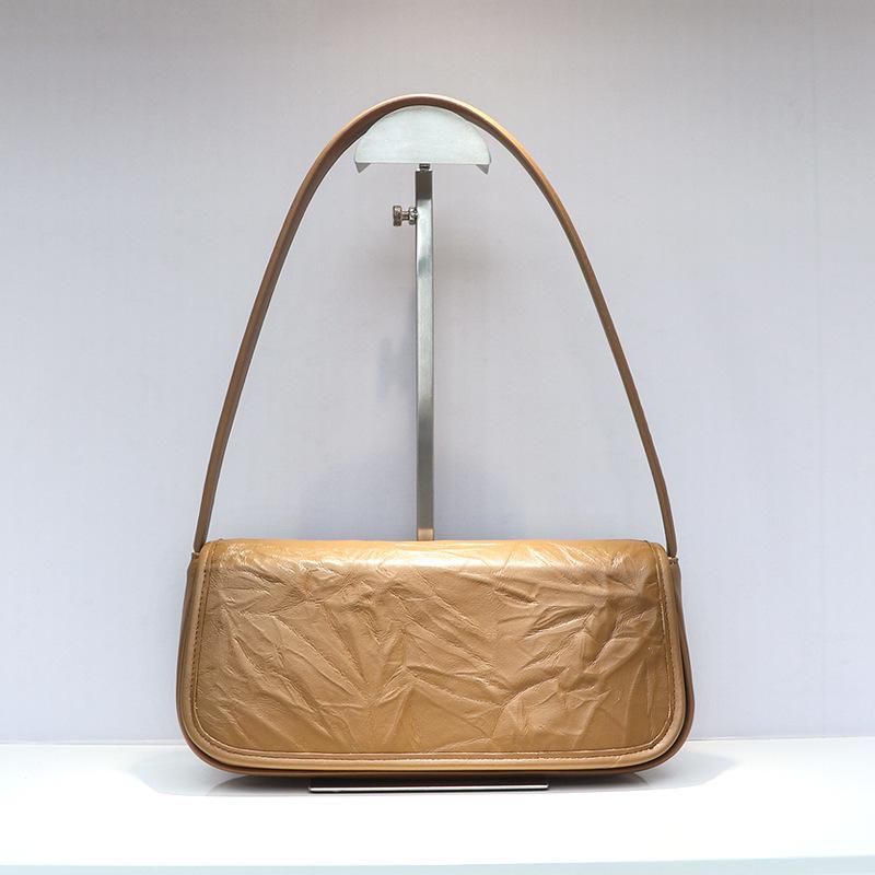 

24 New High-quality Niche Design Flip Style Stick Bag Cross-border Simple Pleated Top Layer Cowhide Shoulder Armpit 26cm