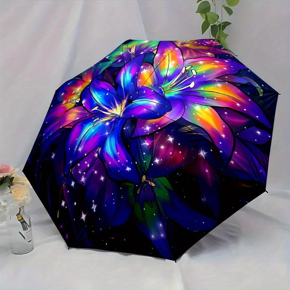 Folding Umbrella The umbrella features vivid multicolored lilies against a dark starry background. Fits Travel, Backpack, Gift