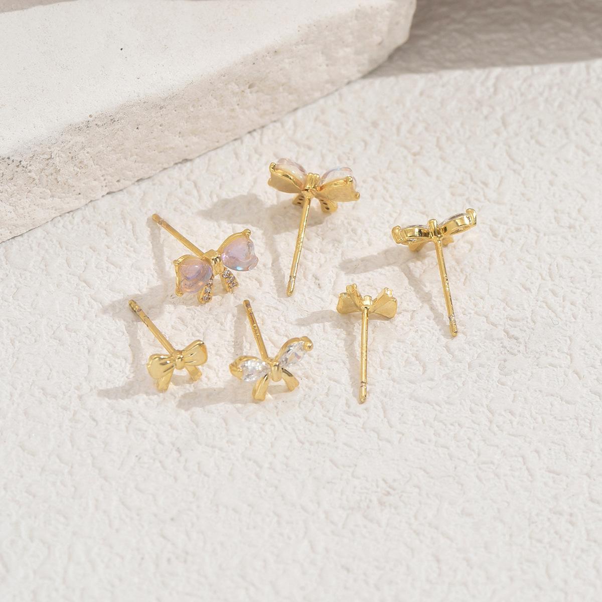 

2025 новый набор женских серег в японском и корейском стиле, нишевые серьги-пусеты с дизайном бантика, инкрустированные драгоценными камнями, женские универсальные