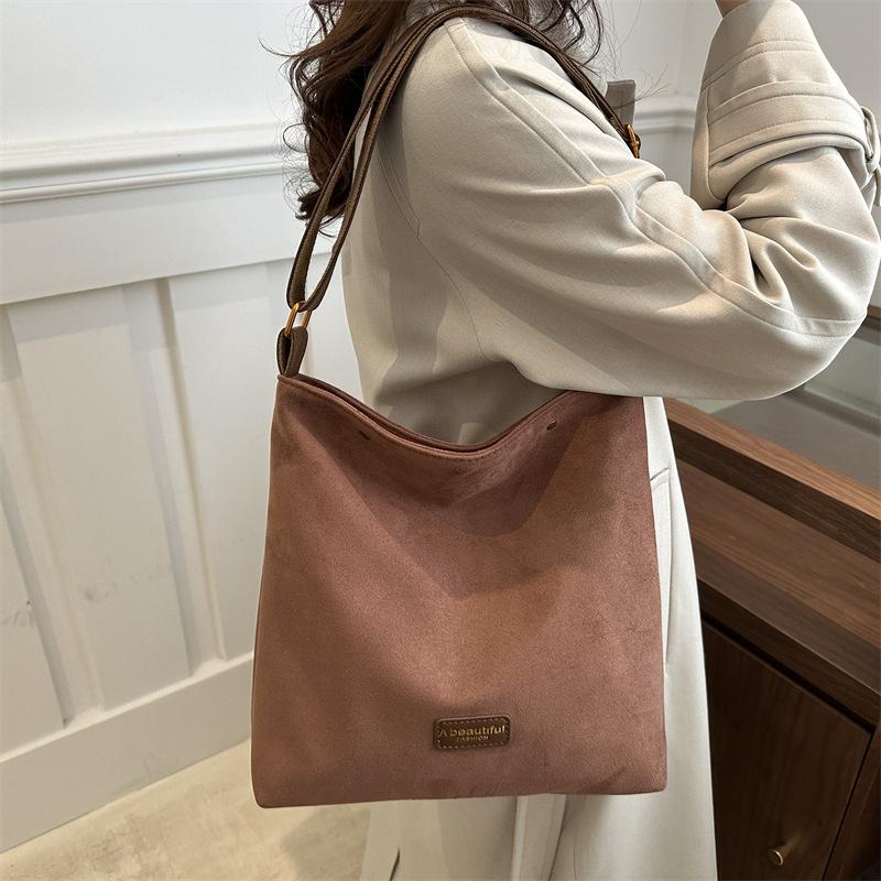 Super fire niche leopard print bag women's 2025 new popular versatile messenger bag single shoulder underarm bucket bag