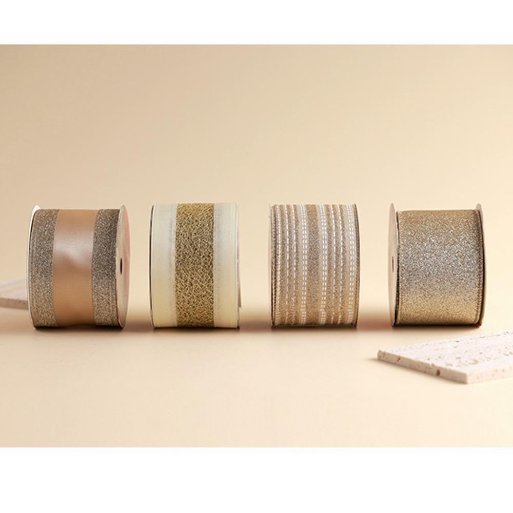 

Золотий бант кольору шампанського. 10 ярдів. Банти. Ремісничі прикраси. Різдвяні стрічки. Різдвяні прикраси. 7