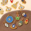 European and American retro exotic jewelry pendant golden Fatima hand evil eye element decorative pendant