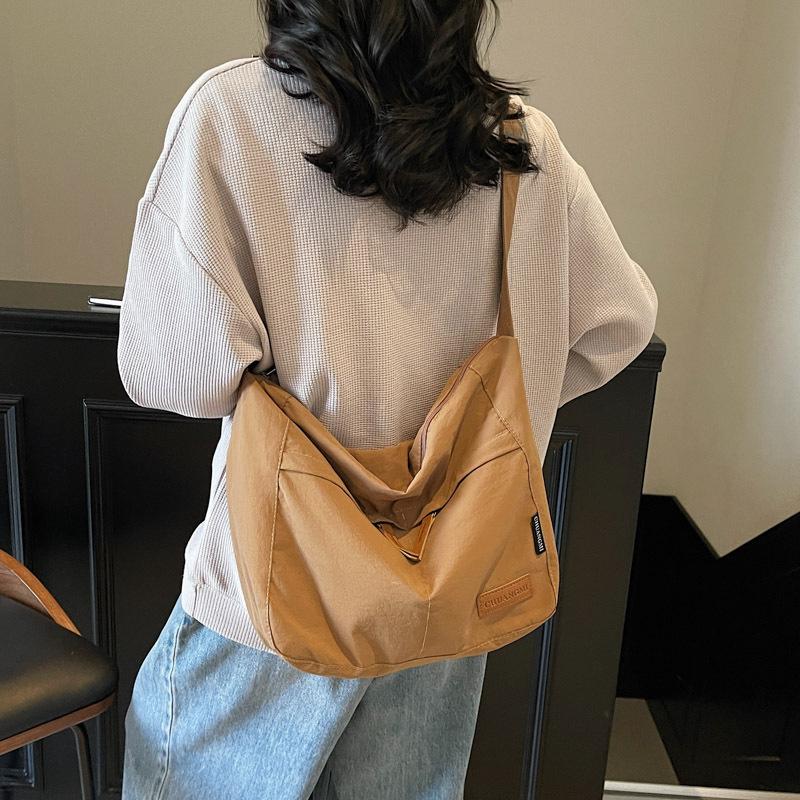 Canvas bag women's large-capacity new versatile shoulder messenger bag cloth bag class commuter tote bag