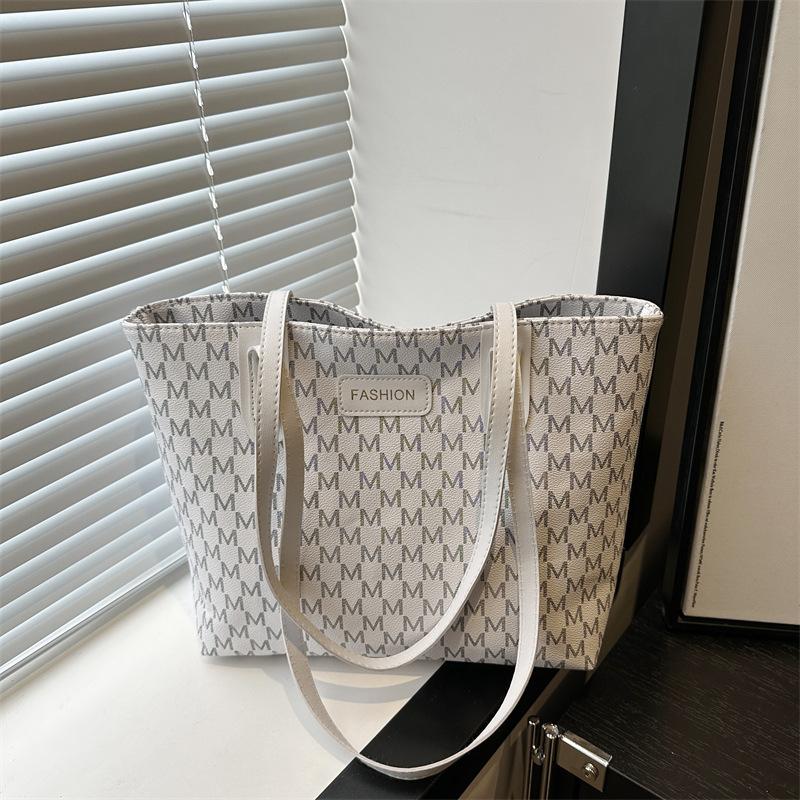 Textured Women's Bags, New Tote Bags, Fashionable Letter Bags, Simple and Trendy Shoulder Armpit Bags.