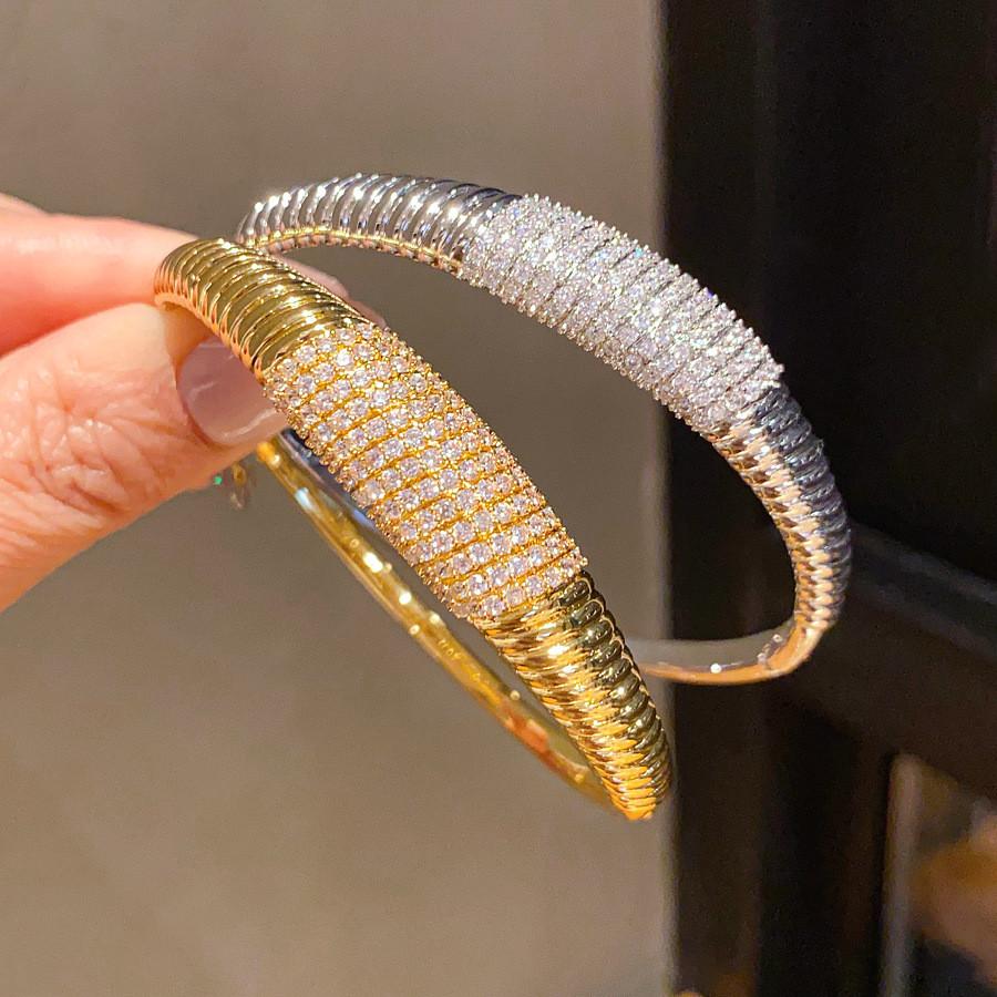 Elegant Striped Oval Bangle Bracelet With Gold Plating For Fashionable Women
