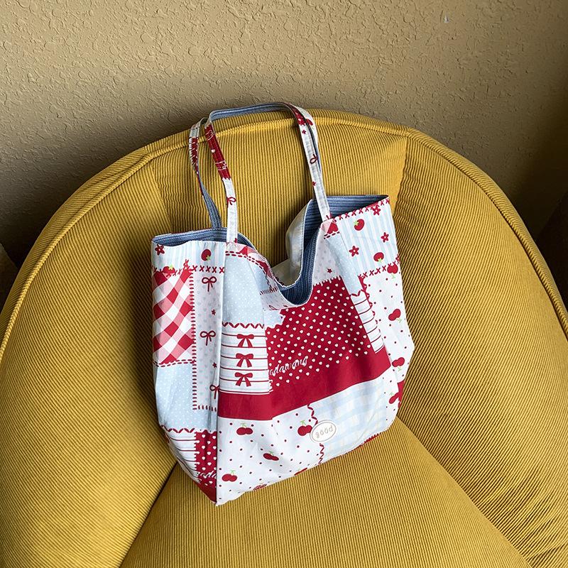 

European and American striped canvas tote bag fashionable and simple portable women s bag commuting to work simple niche shoulder bag