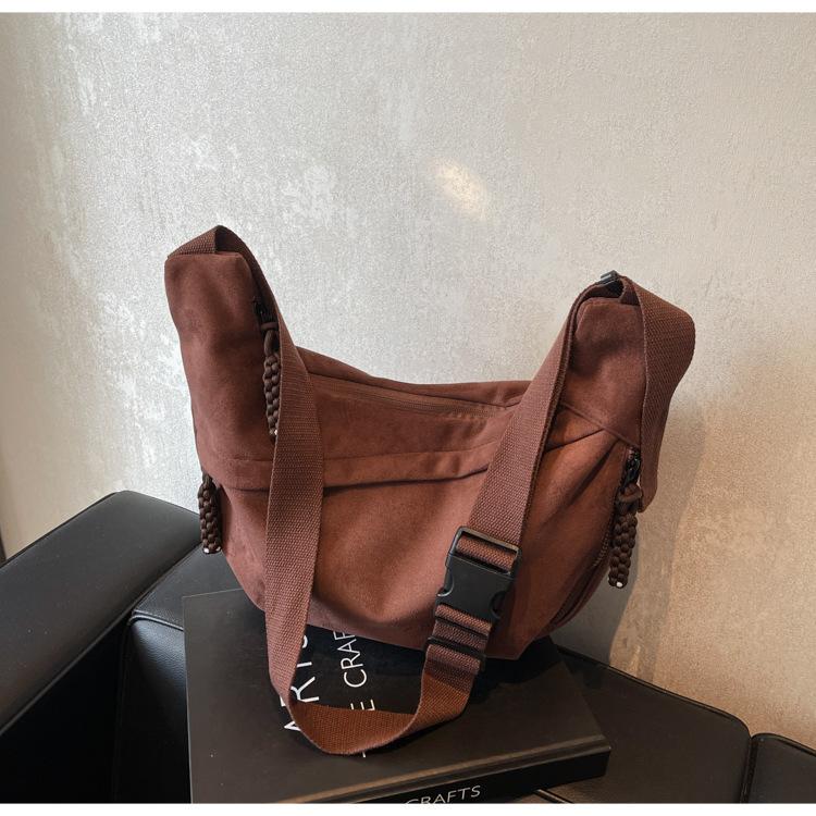 

Niche design large-capacity class commuter dumpling bag women 2025 new casual versatile shoulder messenger bag