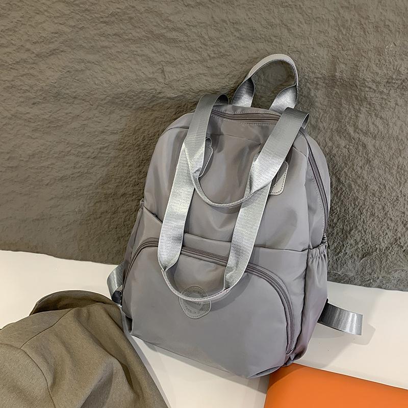 Schoolbag New Large-capacity Backpack Korean Version of Leisure Travel Simple and Versatile Shoulder Bag Women's Bag Multi-functional Tote Bag