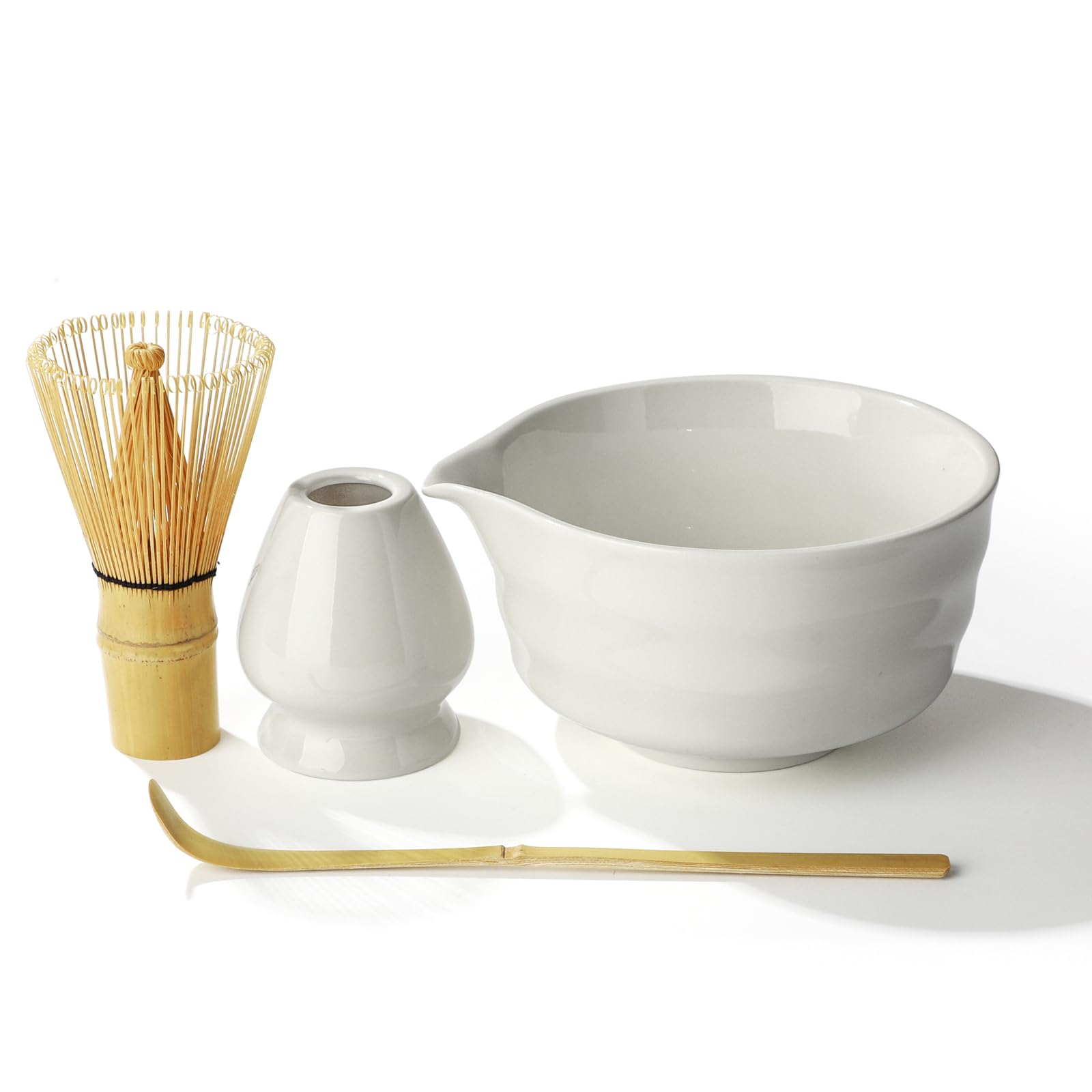 

Tea ceremony set including a spouted matcha a tea whisk a tea whisk and a tea bowl, (100 prisms), stand, scoop.